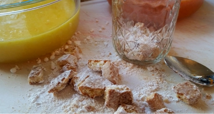 Quarter the Savanna Smiles Girl Scouts Cookies and place on the bottom of the jar